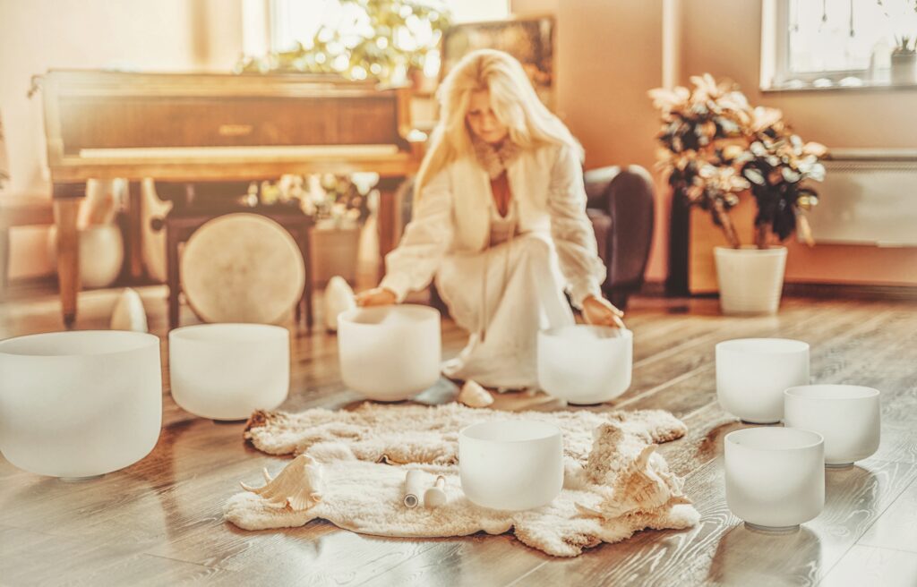 Woman,Playing,On,A,Crystal,Bowl.,Ceremony,Space.