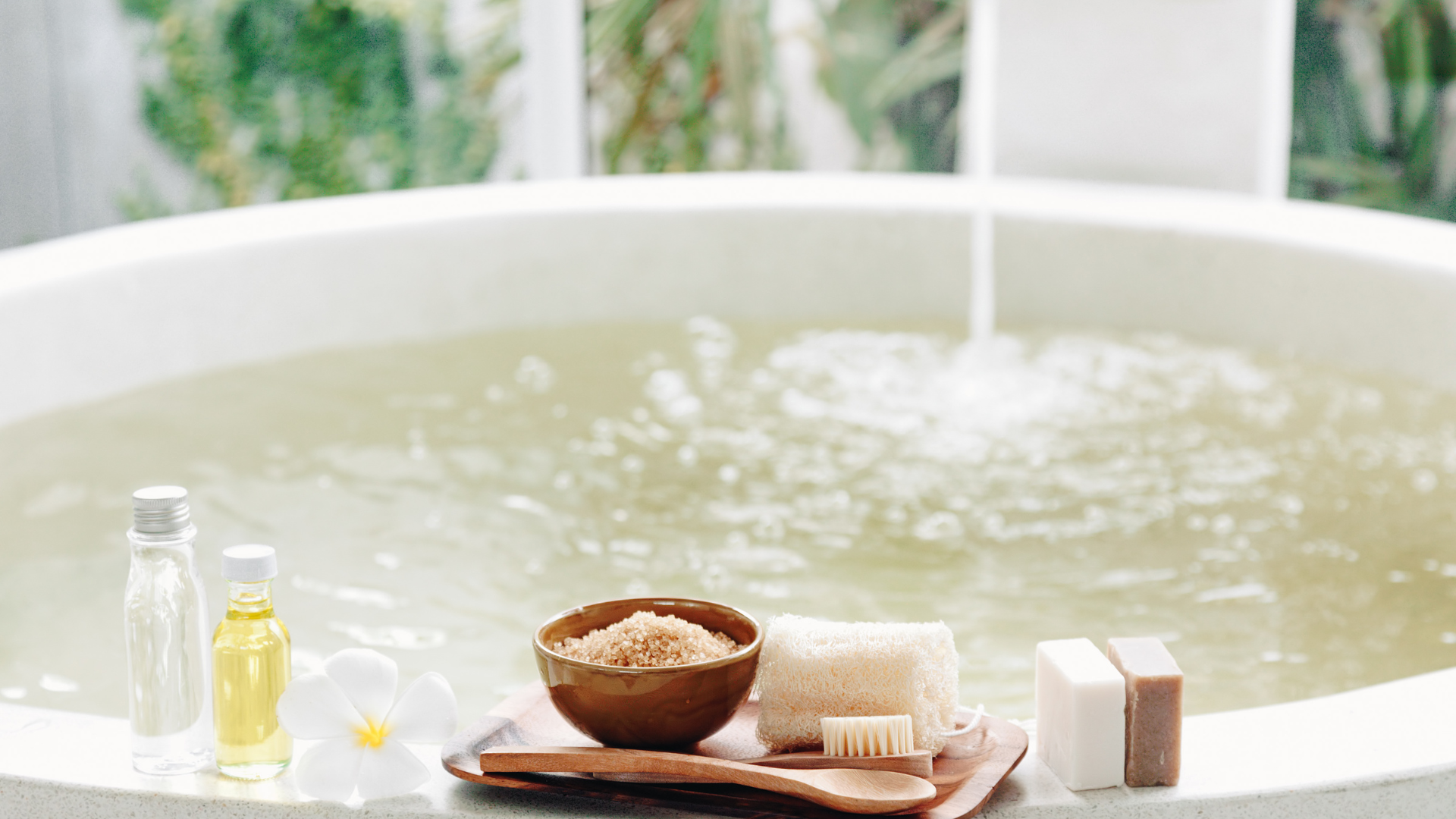large soak in tub with bath salts and oils on the edge